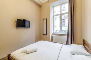 Фото номера Апартаменты с 1 спальней Апартаменты Apartment on Stavropihiiska Street 3 г. Львов 7