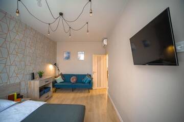 Фото номера Апартаменты с 3 спальнями Апартаменты 3 Bedroom Apartment in the city center г. Львов 35