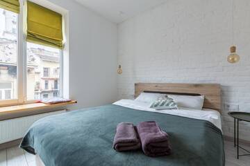 Фото номера Апартаменты с 1 спальней Апартаменты ROMANTIC Apartments- view of the Town Hall г. Львов 8