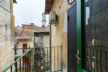 Фото номера Апартаменты с 1 спальней Апартаменты ROMANTIC Apartments- view of the Town Hall г. Львов 11