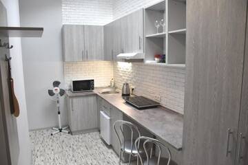 Фото номера Номер-студио с видом на сад Апартаменты Central Mansard Studios г. Львов 10