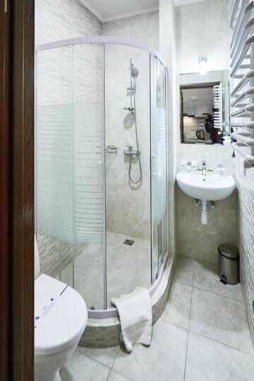 Фото номера Стандартный двухместный номер с 1 кроватью Отель ANTARES Apart hotel г. Львов 9