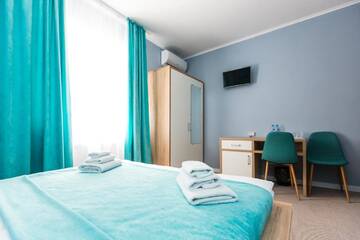 Фото номера Стандартный двухместный номер с 1 кроватью Отель Blum Hotel г. Львов 5