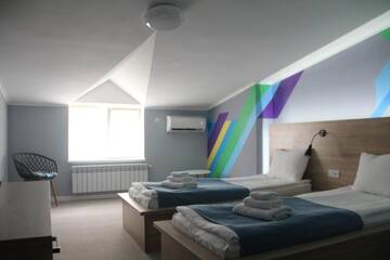 Фото номера Стандартный двухместный номер с 2 отдельными кроватями Отель Blum Hotel г. Львов 2