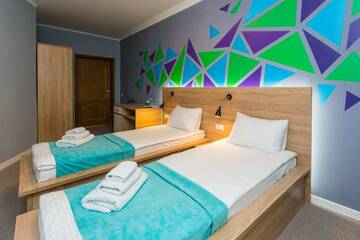 Фото номера Стандартный двухместный номер с 2 отдельными кроватями Отель Blum Hotel г. Львов 4