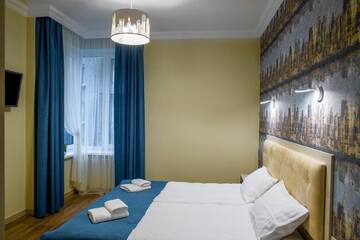 Фото номера Номер с кроватью размера «king-size» Апарт-отели Mini Hotel Barvy Lvova on Hnatyuka St. г. Львов 10