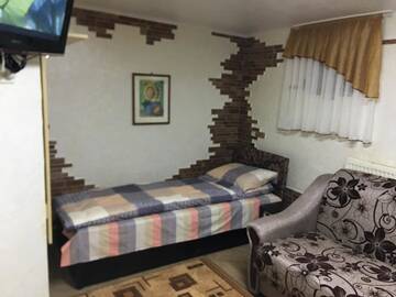 Фото номера Двухместный номер с 2 отдельными кроватями Отель Hotel Rafinad г. Львов 5