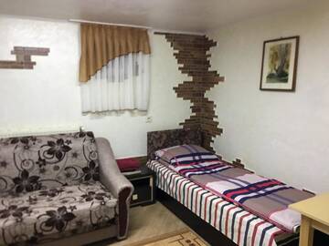 Фото номера Двухместный номер с 2 отдельными кроватями Отель Hotel Rafinad г. Львов 2