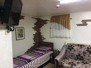 Фото номера Двухместный номер с 2 отдельными кроватями Отель Hotel Rafinad г. Львов 3