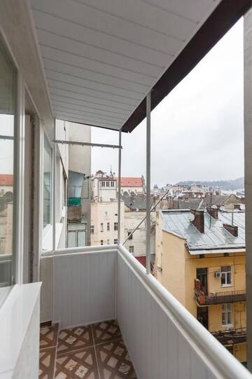 Фото номера Апартаменты Апартаменты Apartment on Svobody 6/8-3 г. Львов 18