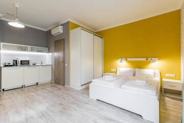 Фото номера Апартаменты с балконом Апарт-отели Opera Passage Apart Hotel г. Львов 6