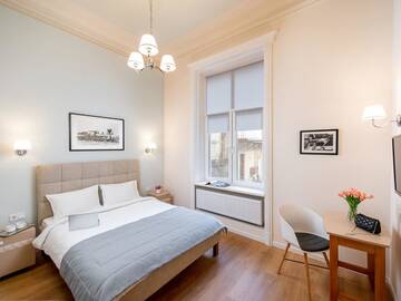 Фото номера Улучшенный номер с кроватью размера «king-size» Отель Art Deco Central Rooms г. Львов 4