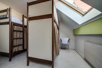 Фото номера Односпальная кровать в общем номере с 6 кроватями Хостелы Ostriv Hostel г. Львов 5