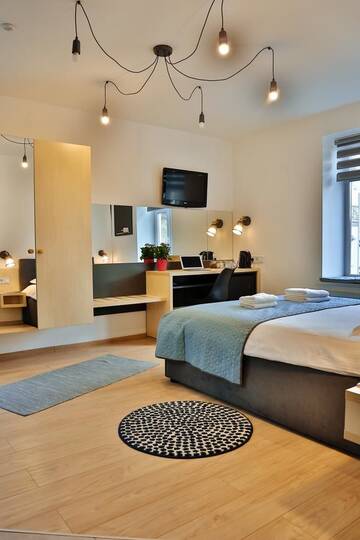 Фото номера Улучшенный четырехместный номер Апартаменты Apartment and Rooms TimetoSmile г. Львов 20