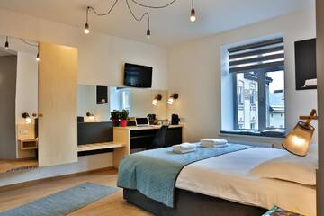 Фото номера Улучшенный четырехместный номер Апартаменты Apartment and Rooms TimetoSmile г. Львов 21