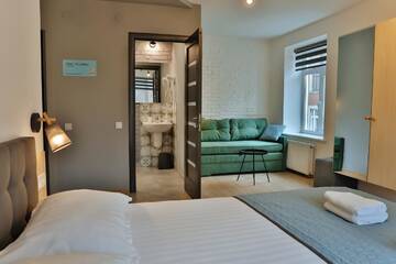 Фото номера Улучшенный четырехместный номер Апартаменты Apartment and Rooms TimetoSmile г. Львов 13