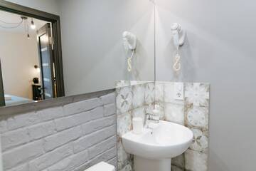 Фото номера Улучшенный четырехместный номер Апартаменты Apartment and Rooms TimetoSmile г. Львов 9