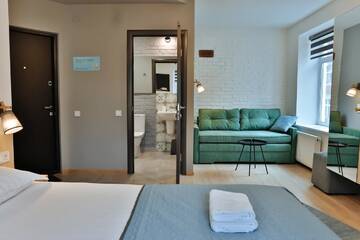 Фото номера Улучшенный четырехместный номер Апартаменты Apartment and Rooms TimetoSmile г. Львов 14