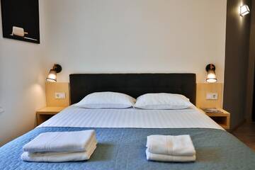 Фото номера Улучшенный четырехместный номер Апартаменты Apartment and Rooms TimetoSmile г. Львов 17