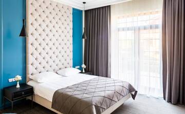 Фото номера Улучшенный двухместный номер с 1 кроватью Отель Hotel Rafael г. Львов 3