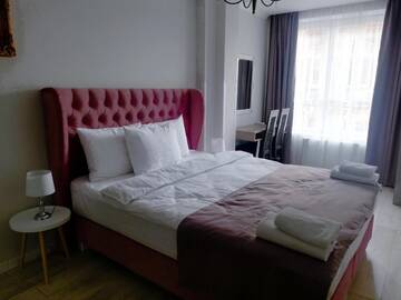 Фото номера Номер Делюкс с кроватью размера «king-size» Отель Opera Center Hotel г. Львов 2