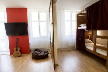 Фото номера Апартаменты с 3 спальнями Апартаменты Apartment Sova Lviv Center to 10 person г. Львов 12