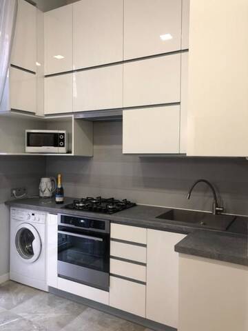 Фото номера Апартаменты с 3 спальнями Апартаменты Viktoriya Deluxe Apartment г. Львов 55