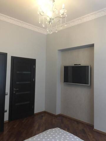 Фото номера Апартаменты с 2 спальнями Апартаменты APARTMENT ON CENTRE LVIV г. Львов 54