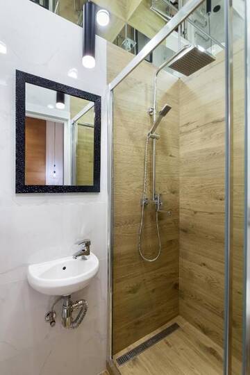 Фото номера Апартаменты с 1 спальней Апартаменты Loft-studio on Tamanska 8 г. Львов 16