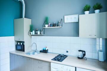 Фото номера Апартаменты Апартаменты Cozy Apartment in the center, 5mins from Opera г. Львов 47