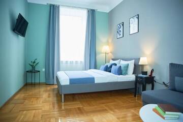 Фото номера Апартаменты Апартаменты Cozy Apartment in the center, 5mins from Opera г. Львов 10