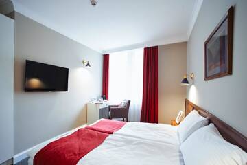 Фото номера Стандартный двухместный номер с 1 кроватью Отель Sherlock Holmes Boutique Hotel г. Львов 4