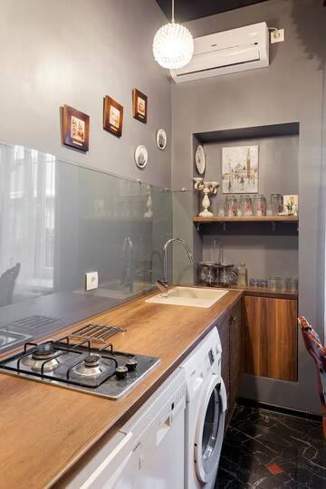 Фото номера Апартаменты с 3 спальнями Апартаменты Deluxe Leopolli, 3 rooms г. Львов 6