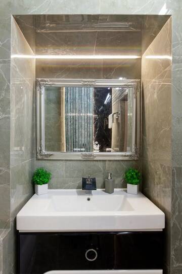 Фото номера Апартаменты с 3 спальнями Апартаменты Deluxe Leopolli, 3 rooms г. Львов 33